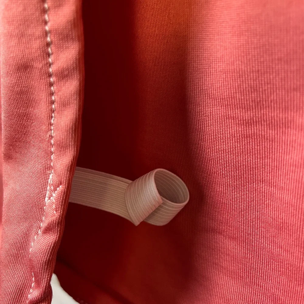 The Ollie‎ Swaddle Coral Pink Adjustable Infant Sleep Wrap
